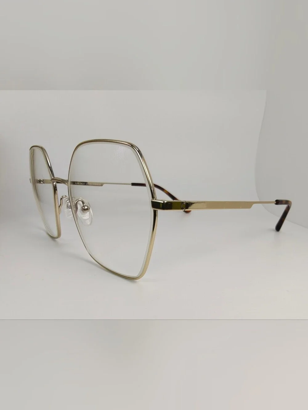 Elixir. Titanium.Gold Polygon. Metal Frame Women's Eyewear.